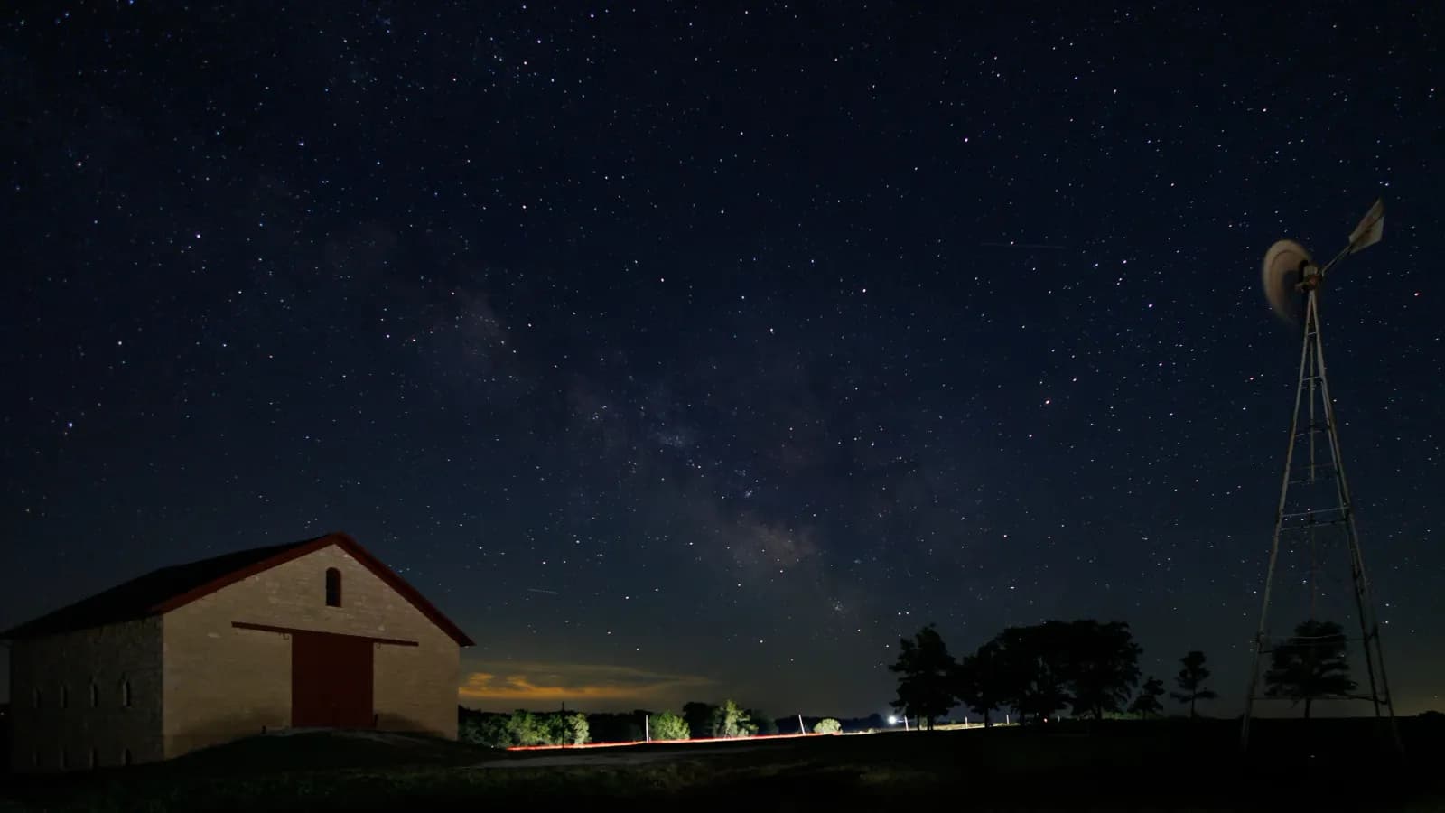 Milky Way over stone barn