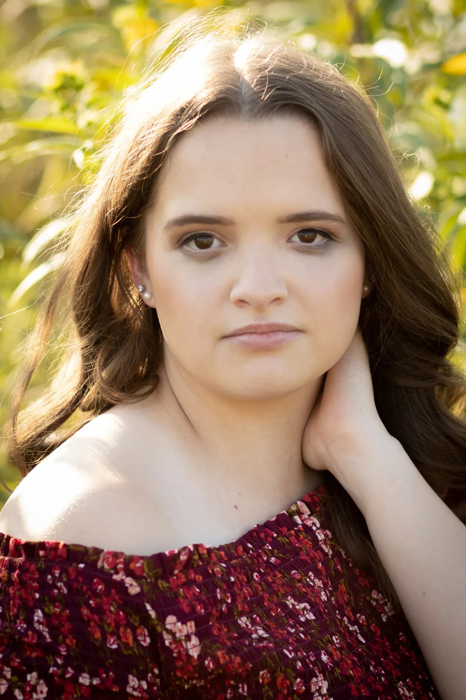 Girl in red dress at golden hour