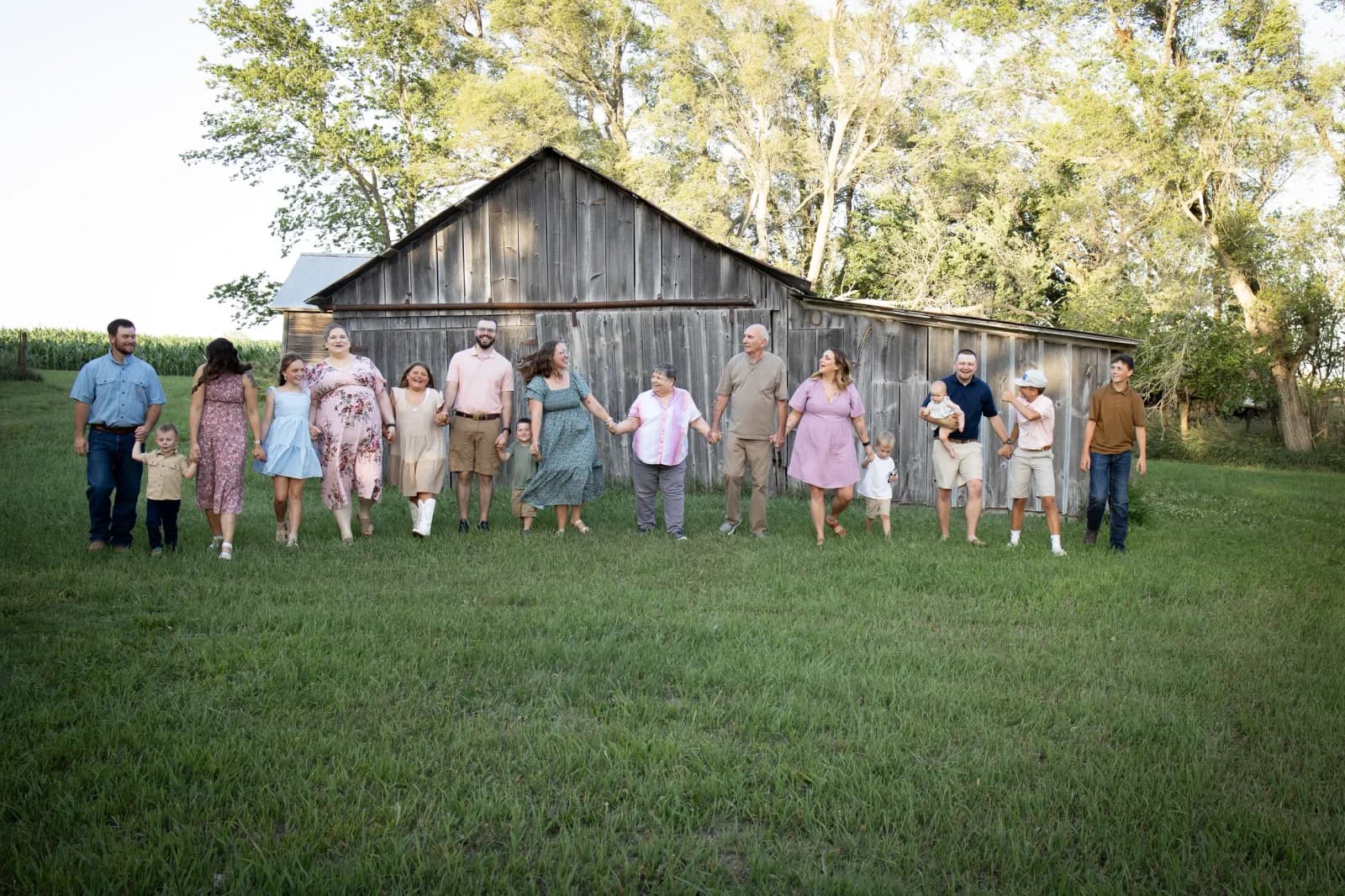 Large multigenerational family walking towards camera